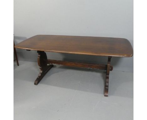 ERCOL - A mid-century model 419 oak-topped refectory dining table on trestle base, with maker's label. Length 183cm, height 7