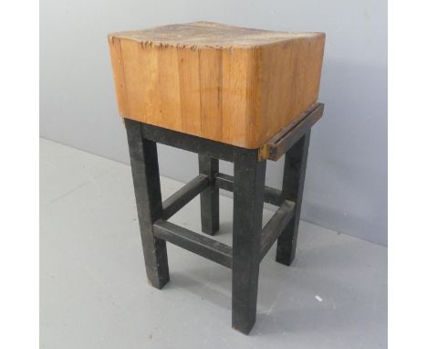 A vintage solid mixed timber Butchers Block on a painted square base. Width: 49 Height: 87 Depth: 44General ageing to the pie