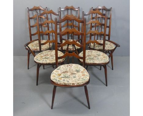 ERCOL - A set of six model 496 mid-century beech and elm "batwing" dining chairs. (4+2)