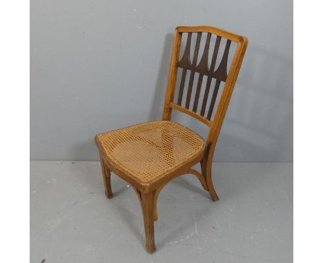 GUSTAV SIEGEL for JACOB &amp; JOSEF KOHN Vienna, bentwood child's or nursing chair, circa 1905, fretwork arrow motif to backr