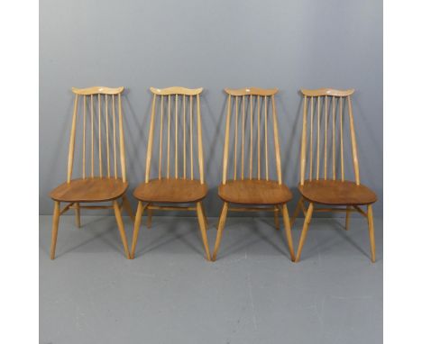 ERCOL - A set of four of mid-century beech and elm stick-back model 369 Goldsmith dining chairs.