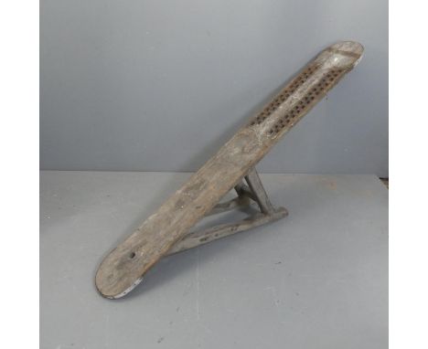 A Vintage pine workshop stand, possibly for hemp cutting. Length 176cm, height 89cm, width 22cm.