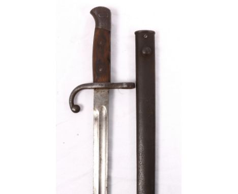 Sword bayonet having fullered blade, hooked quillon and wood grip with scabbard, blade length 55cm, bayonet length 67.5cm.