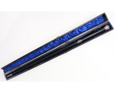 Silver mounted ebonised swagger stick in fitted case.