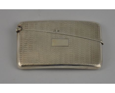 A George V silver card case of curved rectangular form and engine turned decoration, Birmingham 1929