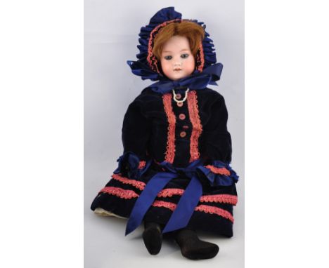An Early 20th Century Armand Marseilles bisque headed jointed doll with sleeping eyes and open mouth, impress mark 390N, h:46