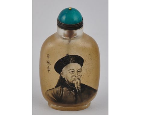 A Chinese Peking glass snuff bottle decorated with a portrait of Li Hongzhang (Qing dynasty official) and characters on the r