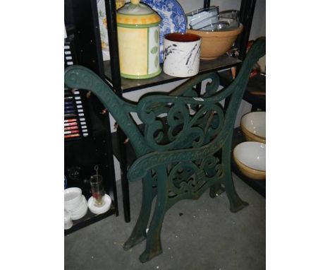 A pair of cast iron garden bench ends. (collect only)