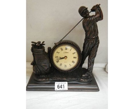 A golf related mantel clock.