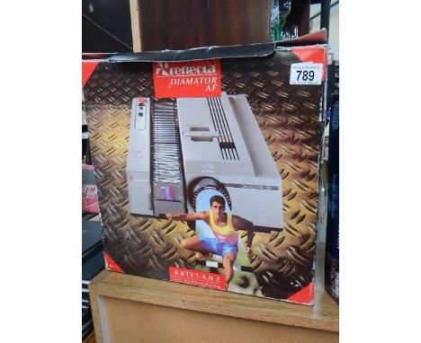 A boxed slide projector. Collect only.