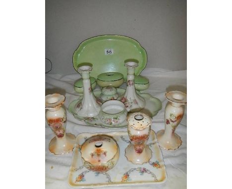 Two ceramic dressing table sets.