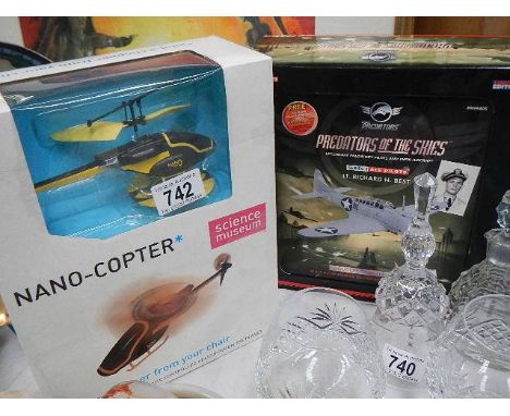 A Corgi 'Predator's of the Skies' boxed set and a Science Museum Nano Copter.