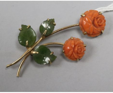 A gold, carved coral and jade rose brooch, 50mm.