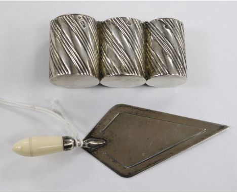 An early 20th century Russian 84 zolotnik silver triple coin case, 63mm and a late Victorian silver ivory handle trowel book 