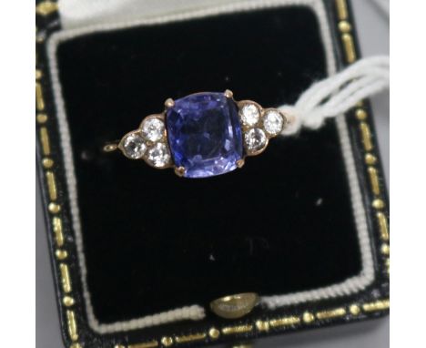 A gold and sapphire set dress ring, with white sapphire? set shoulders, size Q.