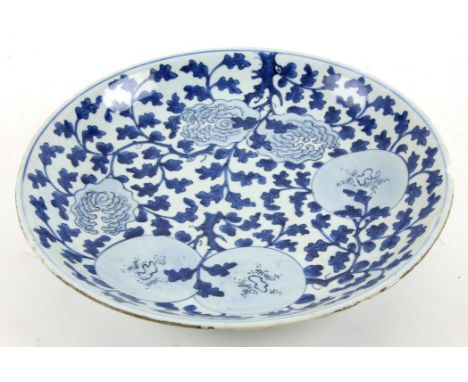 Chinese, possibly Kangxi, blue and white dish decorated with peaches and foliage, Lingzhi fungus mark to base, 34.5cm diamete