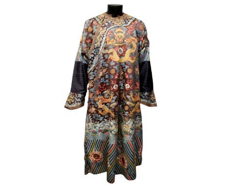  A Fine and unusually detailed Chinese imperial Court robe, Qing period first half 19th C,  embroidered in silk Peking knot a