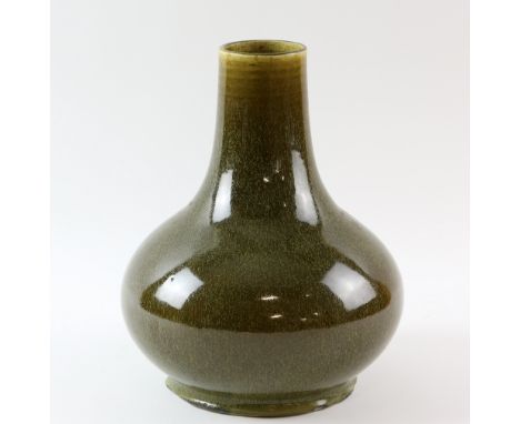 Chinese tea dust glazed vase of bulbous form, on round foot, 26cm high,.    Drilled as a lamp and hole filled.Glaze faults.