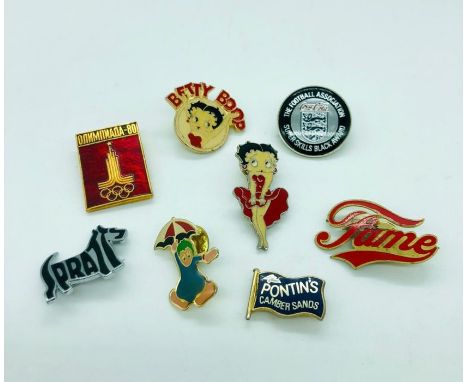 A Selection Of Eight Enamel Retro Badges