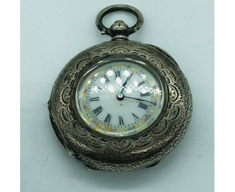 A silver ladies pocket watch with enamel face and ornate decoration.