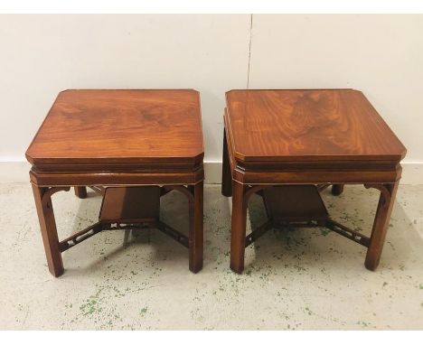 Pair of low side or lamp tables with shaped X stretcher H 50 cm x W 56 cm D 56 cm