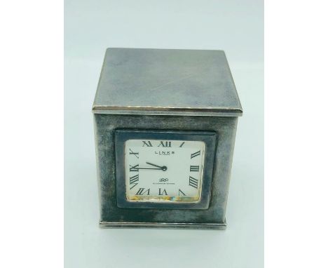 A Links of London four sided carriage clock in silver (5cm X 5cm X 5.5cm) 