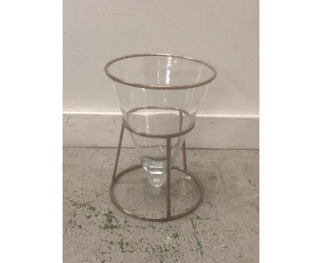 A Conical glass vase in white metal stand