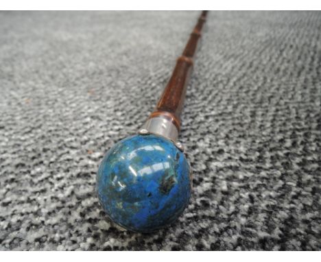 A bamboo walking cane with HM knopp ( marks worn ) holding polished ball handle Lapis Lazuli
Damage to silver cap.
Stick and 