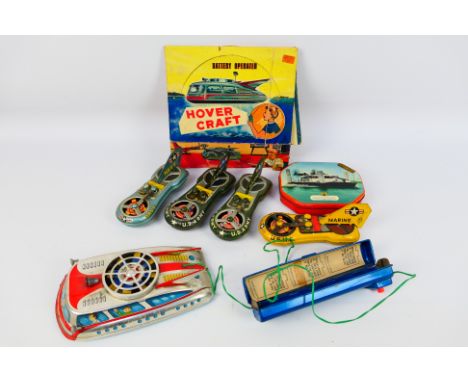 Ichimura - Toplay T.P.S. - 4  x vintage Japanese tinplate hovercraft models with flywheel motors in Navy, U.S. Army and U.S. 