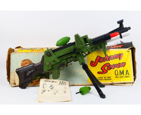 Deluxe Topper Toys UK - A boxed Johnny Seven One Man Army plastic toy gun. This desirable toy shows some signs of play use an