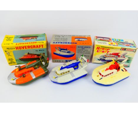 Marx - Clifford - 3 x boxed battery operated Hovercraft models, they appear in Fair to Good condition with some signs of age,