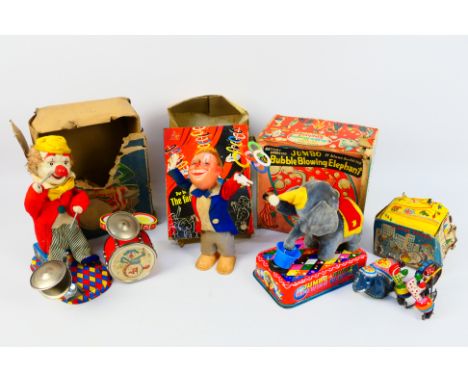 Yonezawa - TPS Toplay - Alps Shoji - Hans Zitsmann - 4 x boxed vintage tinplate models, a TPS clock work Circus Parade, a HZ 