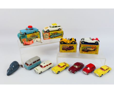 Corgi - Dinky - Matchbox - A group of 10 x cars including Austin A60 driving school car # 236, 2 x Aston Martin DB4 # 218, Ja