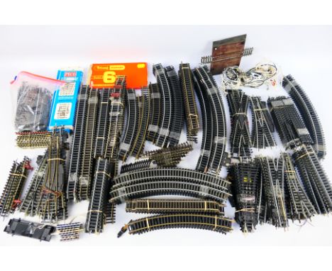 Hornby - Peco - Lima - Jouef - A large quantity of OO gauge track sections including several lengths of straights, curves, po