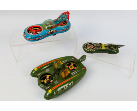 Ichimura - Daiya - Asahi Toy Co - A group of vintage tinplate hovercraft models, 2 x in U.S. Army livery and 1 x in U.S. Air 