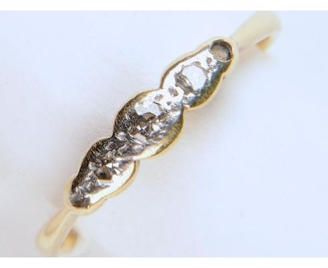 A DIAMOND FIVE STONE RING, WITH RUB OVER SETTINGS, GOLD HOOP MARKED 18CT &amp; PT, 1G, SIZE O½  One stone deficient, worn