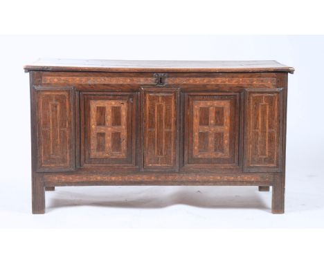 A LATE 17TH C OAK BLANKET CHEST, LATER INLAID AND THE FRONT RE-PANELLED, BOARDED LID, PANELLED SIDES AND BACK, 69CM H; 124 X 