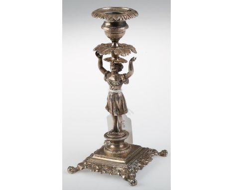 A FRENCH SILVER FIGURAL CANDLESTICK, MID 19TH C, THE LEAFY SCONCE AND DRIP PAN HELD ALOFT BY A LITTLE GIRL STANDING ON A SOCL