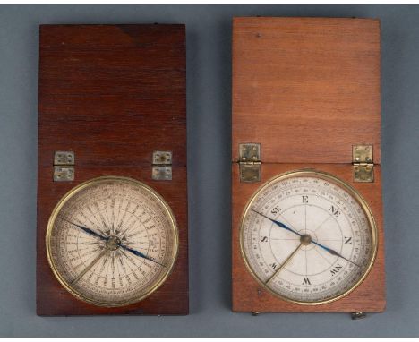 TWO ENGLISH MAHOGANY CASED COMPASSES, EARLY 19TH C, WITH 90MM ENGRAVED PAPER ROSE AND BLUED STEEL NEEDLE BENEATH GLASS WITH B