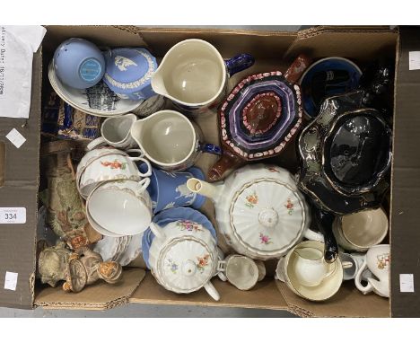 A WURTTEMBERG PORCELAIN&nbsp; TEA SERVICE, PRINTED WITH FLOWERS ON A FLUTED GROUND, TEAPOT, LIDDED SUCCIER, JUG, FOUR CUPS AN