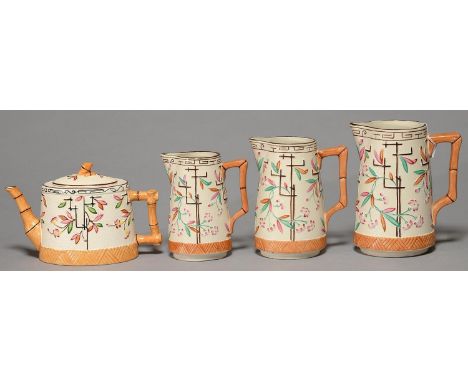 A GRADUATED SET OF THREE AESTHETIC BROWNHILLS POTTERY CO EARTHENWARE JUGS AND A MATCHING TEAPOT AND COVER, 1890,&nbsp; &nbsp;