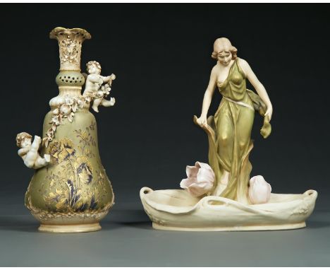 AN ART NOUVEAU  ROYAL DUX PORCELAIN FIGURE  OF A MAIDEN, EARLY 20TH C, GAZING INTO A LILY POND, 33CM H, IMPRESSED 1601, APPLI