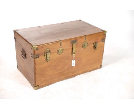 A CHINESE CAMPHOR WOOD TRUNK, SECOND QUARTER 20TH C, WITH BRASS HASP, CATCHES AND ANGLES, INSCRIBED C M TONG, 46CM H; 48 X 84