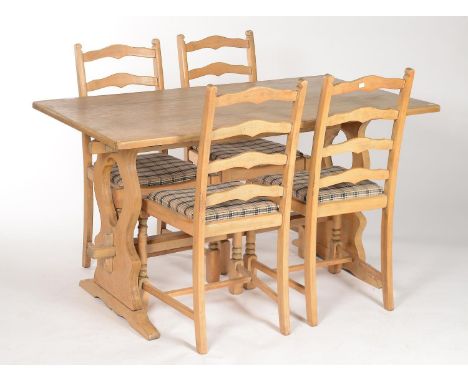 AN OAK TOPPED REFECTORY TABLE, C1960, WITH BEECH TRESTLE SHAPED ENDS JOINED BY A PLAIN CHAMFERED STRETCHER, TOGETHER WITH A S
