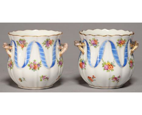 A PAIR OF DRESDEN SEAUX, HELENA WOLFSOHN, C1900, WITH GILT TWIG HANDLES, PAINTED WITH FLOWERS AND A BLUE RIBBON, 8.5CM H, PAI