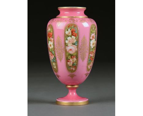 A FRENCH ENAMELLED GLASS VASE, C1870, OF OPAL GLASS CASED IN SHADED PINK AND ENAMELLED IN UPRIGHT REGISTERS WITH FLOWERS ON A