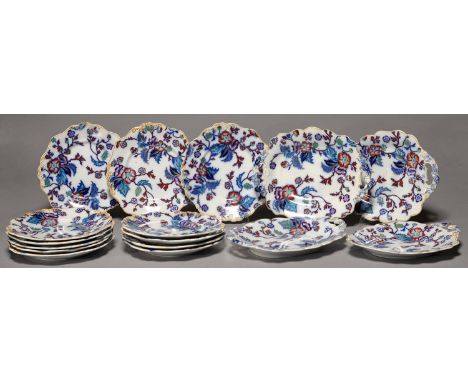 A STAFFORDSHIRE MOULDED EARTHENWARE FLOW BLUE AND ENAMELLED DESSERT SERVICE, C1860 IN A FLORAL PATTERN, THE LIGHTLY MOULDED A