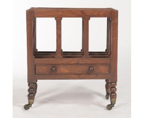 A REGENCY ROSEWOOD CANTERBURY, C1820, FITTED WITH A DRAWER, ON BOBBIN TURNED LEGS WITH BRASS CASTORS, 48CM H; 27 X 42CM  One 