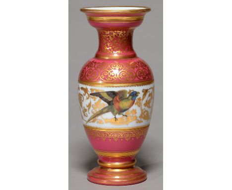 A FRENCH ENAMELLED AND GILT GLASS VASE, C1850, OF OPAL GLASS CASED IN PINK, THE CENTRAL BAND PAINTED WITH BRIGHTLY PLUMAGED B