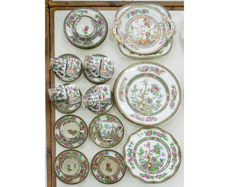 A SET OF EIGHT COALPORT INDIAN TREE PATTERN COFFEE CANS, NINE SAUCERS, SUGAR BOWL AND COALPORT TEA AND DESSERT WARES EN SUITE